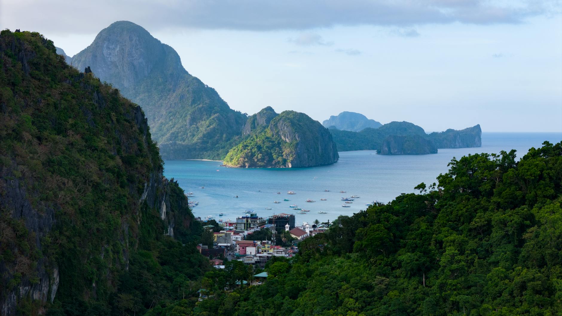 Stunning view of El Nido's lush islands and blue waters in Palawan, Philippines.