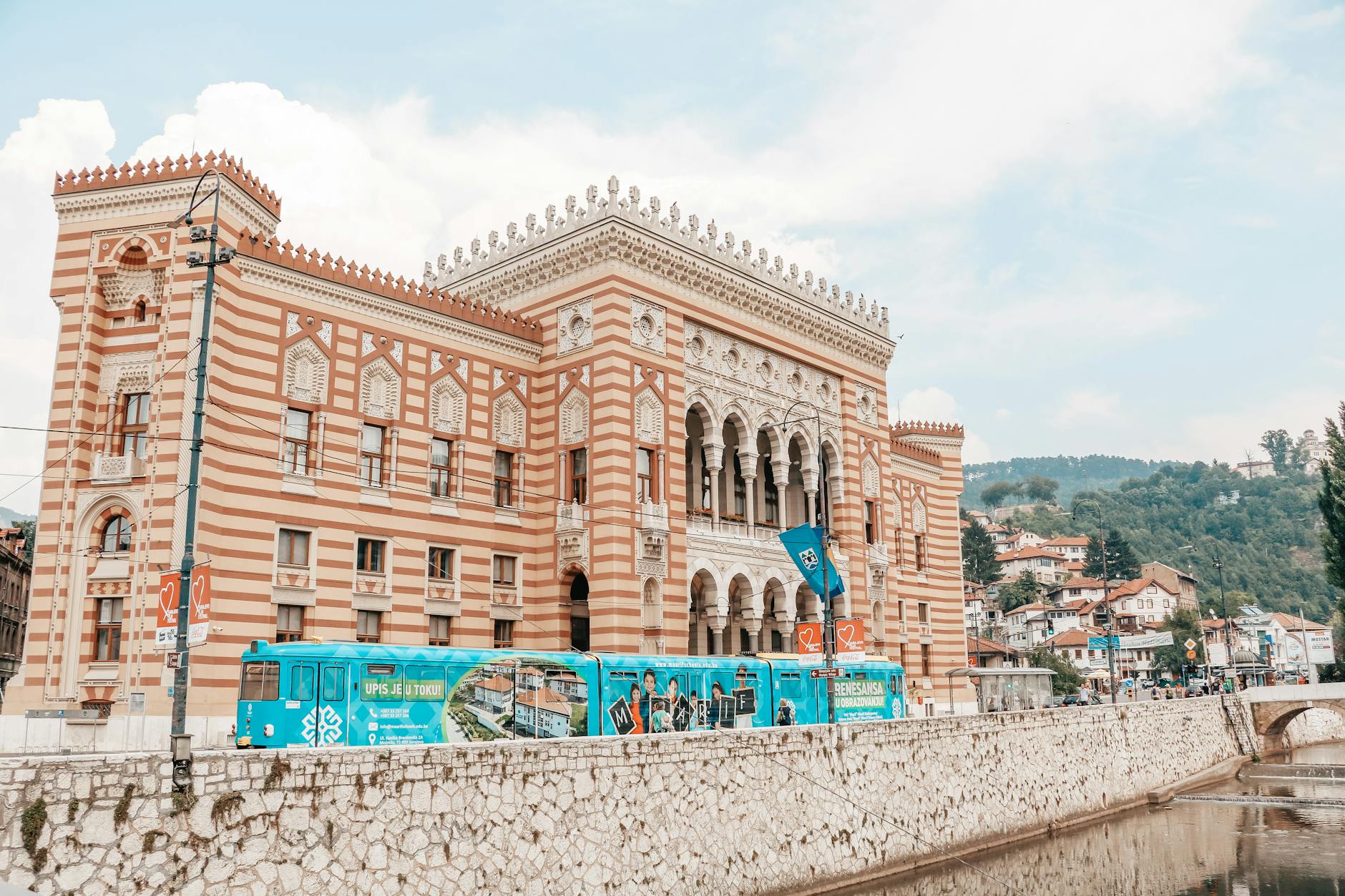 A stunning view of the historic Vijećnica City Hall in Sarajevo, Bosnia and Herzegovina, highlighting its ornate facade.
