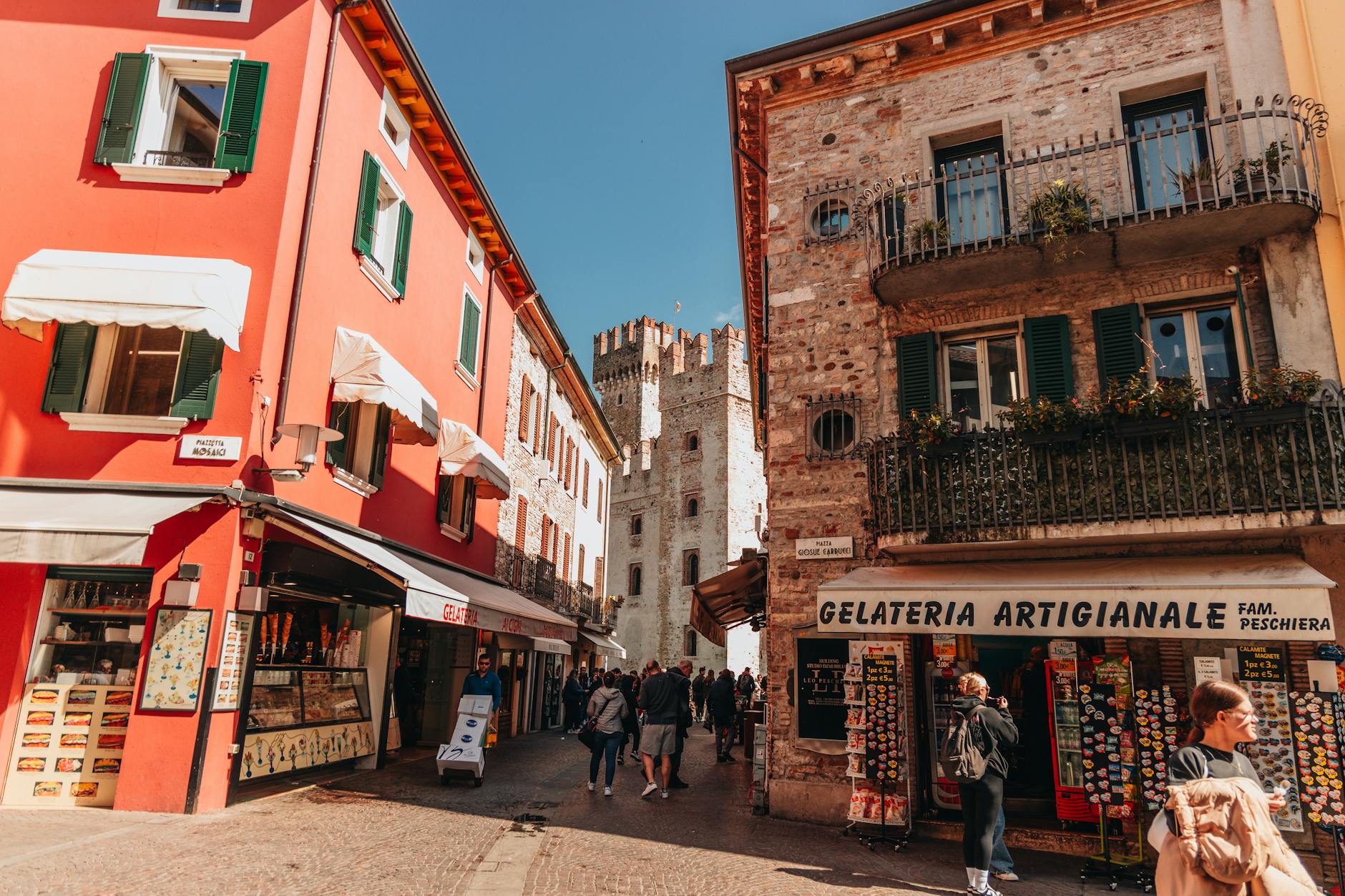Captivating view of a vibrant Italian street with a gelateria, capturing the essence of historic charm and architectural beauty.