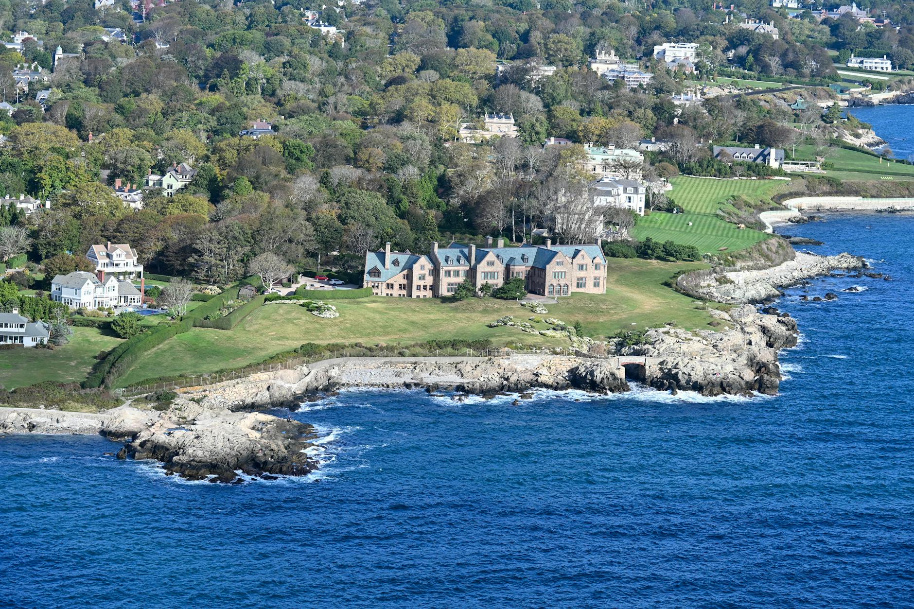 Aerial shot of coastal homes in Newport, Rhode Island with stunning ocean views.