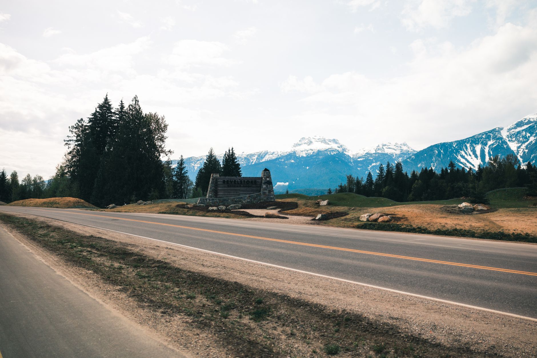 Explore the breathtaking mountain landscape along a road in Revelstoke, BC, Canada.